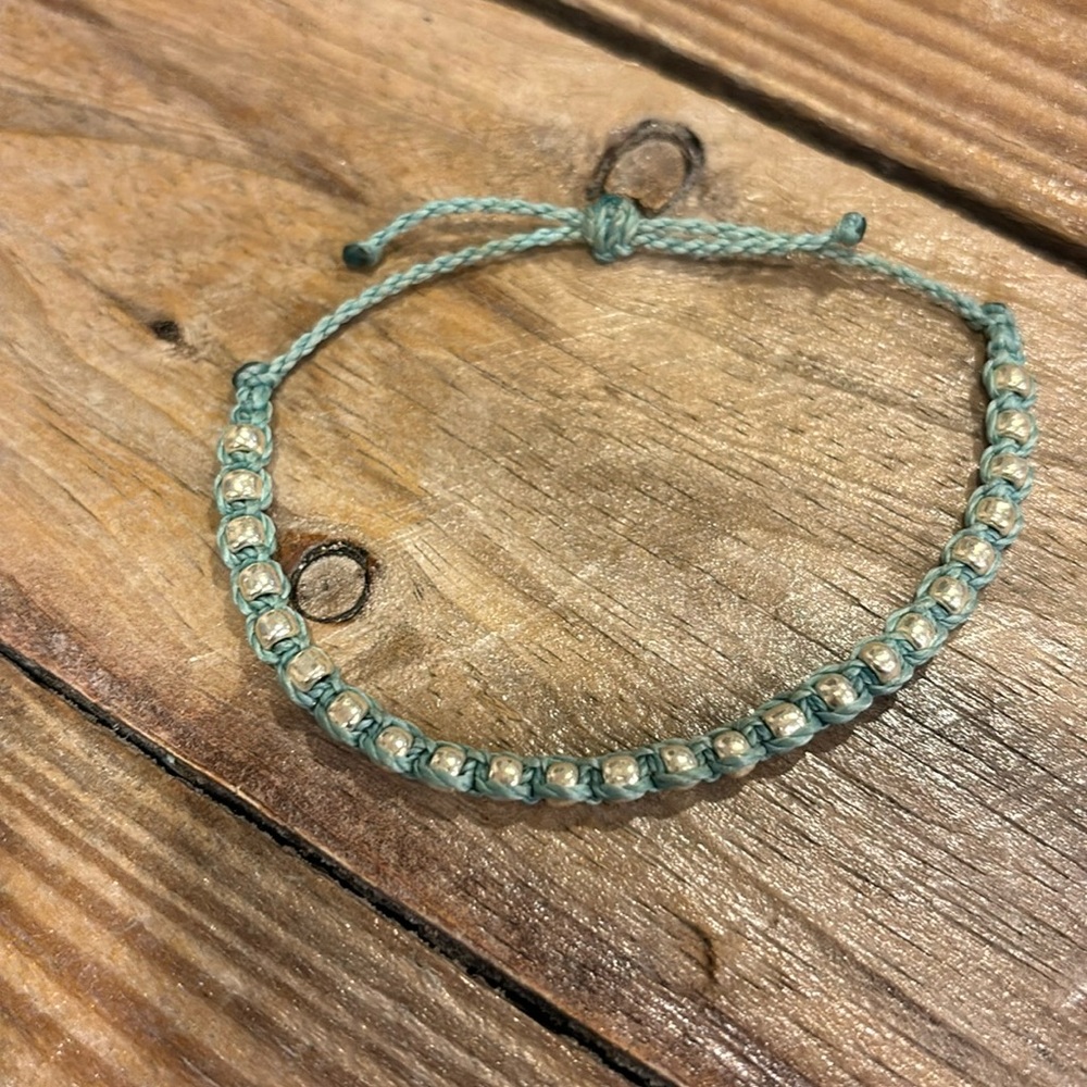 Silver studded multi strand bracelet on waxed polyester cord, mint green